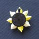 Light-bright-yellow-kirigami-pinwheel-pendant-back